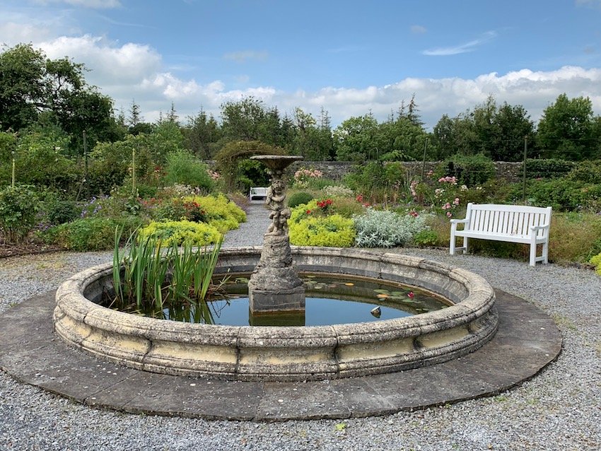 The pond at Woodville surrounded by scented roses